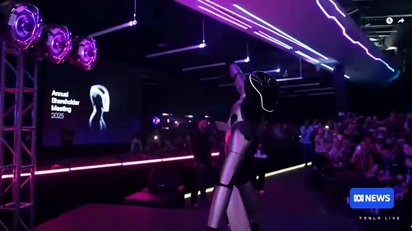 Robot dances on stage at Tesla 2025 annual share holder meeting