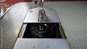 Shuttle from a sewing machine. Internal mechanism of a sewing machine. Old sewing machine.