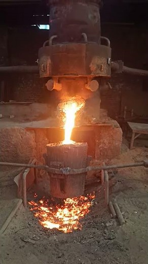 tapping of molten metal in bull ladle ( cupola furnace)