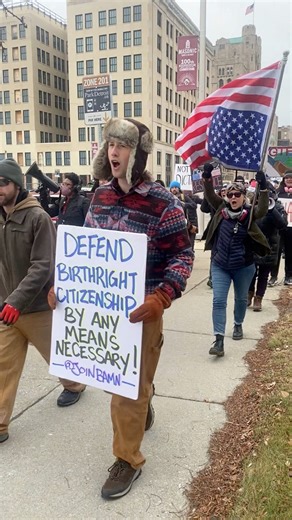 More than 100 protesters march down the sidewalk toward MotorCity Casino in Detroit, the location of President Donald Trump's planned speech to the Detroit Economic Club on Tuesday, Jan. 13, 2026. Get full coverage of Trump's speech and today's protests on Freep.com today. 📹 Video by Darcie Moran, DFP. #trump #detroit #michigan #protests | Detroit Free Press