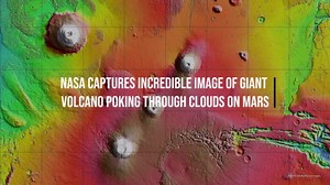 NASA Captures Incredible Image Of Giant Volcano Poking Through Clouds On Mars