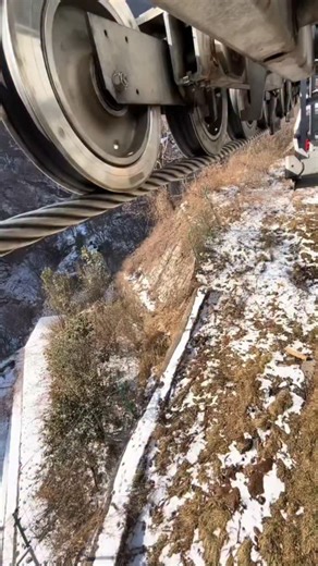 techy Universe on Instagram: "A close-up view of the mechanical system of a cable car / ropeway taken from underneath. You can see steel rollers, pulleys, and guide wheels mounted on a heavy metal frame. These rollers support and guide the thick steel wire rope that carries the cable car cabins. The structure is built with high-strength steel plates, bolts, and brackets, designed to handle constant load, vibration, and movement. The alignment of the rollers ensures smooth motion, reduced frictio