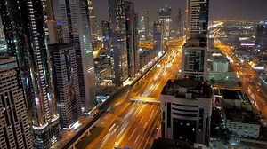 Time lapse of modern futuristic cityscape skyline view