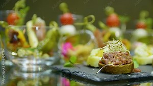 Close-up of skewer canapes on the buffet table. Buffet food in a restaurant.