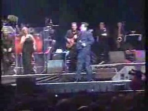 Mexican Singer falls off Stage.flv