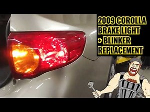 How to replace the tail light bulbs in a Toyota Corolla?