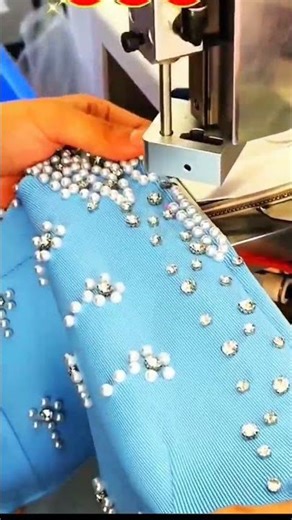 "Fabric embellishment method attaching beads with machine"