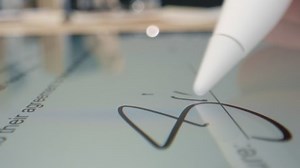 Electronic Signature on Tablet Computer by Stylus in Male Hand. Sign Document of Deal on PC at Work in Office Indoors. Write Business Agreement for Entrepreneur. POV is Contract and Initials of Client
