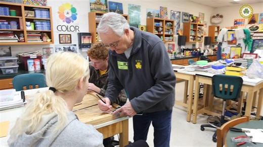 Students in Mrs. Katrina Waters’ IB Art 2 class took on a social project prior to the Christmas holidays. Local stained glass expert Kelly Canady visited the class over several weeks and guided students through the entire process—from initial specification drawings to cutting, grinding, and finally soldering the glass into place for their panes. Devontay Vickers, Jeff Davis, Mylee Wicker, and Keith Moise each created one-of-a-kind stained glass windows, which they presented to their moms and gra