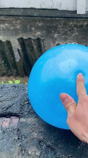 Experiment: Will a water balloon explode when it rolls down from a tall building? 💥🎈#baloon