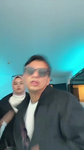 Modern Dance Duo in Captivating Blue Lighting