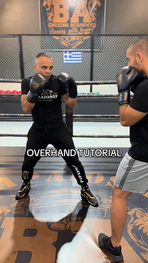 Start in your boxing stance with your hands up. Rotate your body and pivot your back foot as you lift your back elbow high | Boxing Style