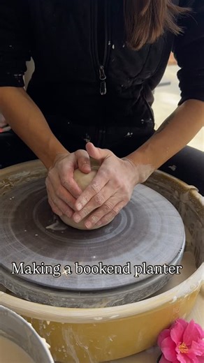 Making the base for a bookend planter! 🤍 Thrown as one solid piece, then once it dries I’ll cut it in half and add the backing. Love watching these come to life on the wheel, even if it wasn’t a great throwing session haha, I learn from rewatching them! #potteryreel #potteryprocess #potterywheel #wheelthrowing #ceramics #ceramicart #handmadeceramics #potterylove #bookendplanter #makersgonnamake #clayartist #pottersofinstagram #ceramicsculpture #creativeprocess #handcraftedpottery | Baldwin Pott