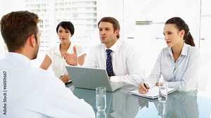 Interview panel explaining to applicant Stock Video