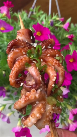 The flavours in this ✨grilled octopus✨ recipe is Asian inspired and cooks in minutes! When I saw these baby octopus in the grocery store I knew this was going to make the perfect little appetizer for all the seafood lovers! ❤️ https://cookinganuway.com/grilled-octopus/ #grilledoctopus #seafoodrecipes #adventurouscooking #exoticfood #seafoodlover