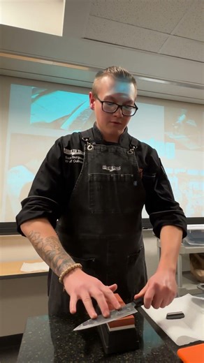 How do you sharpen a knife with a whetstone?