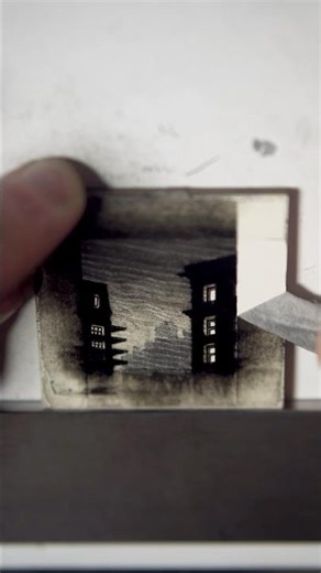 Taking the tape off a drawing in ink on clayboard. Finished this one last summer.