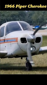 Piper Cherokee 140 landing Oshkosh