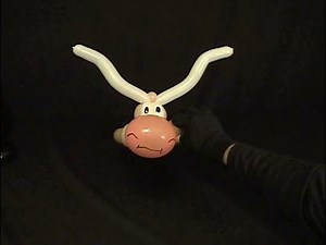 Learn how to make a balloon animal cow hat using balloon twisting