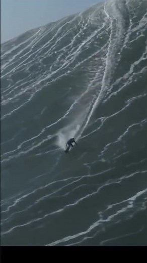 Sebastian Steudtner Rides a Massive Wave at Nazare Portugal #surfing #bigwave #shorts #drone