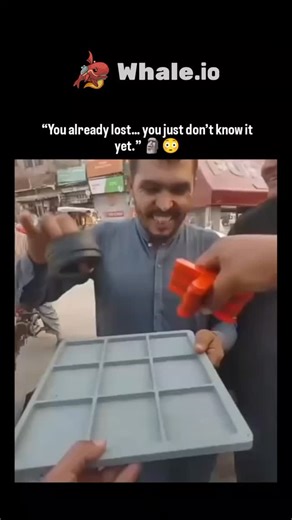 knowledge matrix on Instagram: "This viral clip captures a street game moment where a market hustler confidently defeats every challenger using a magnetic tic-tac-toe board. As players place bright X’s, hidden magnetic O’s quietly shift underneath, guaranteeing the performer’s win even when opponents think they’ve cracked the pattern. The casual Indonesian comment basically hints, “you know how this works, right?” calling out the trick behind the show. These mind-game setups have been around Sou