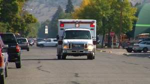 Ambulance With Lights Driving Down Street Stock Footage SBV-300151107 - Storyblocks