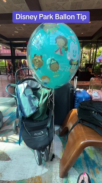 How to take your Disney balloon home with you on the airplane! #disneytip #disneyballoons #disneyhack #disneyworld #marvelousmousetravels #bookwithbrittany #travelagent @Disney Parks