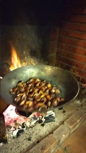 Chestnuts roasting on a open fire.