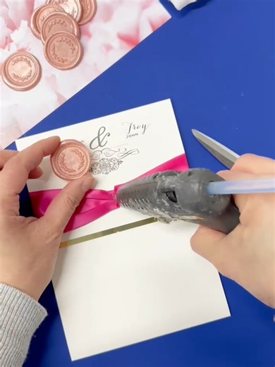 Stephita Wedding Invitations. Adding a pink ribbon and blush wax seal to this trifold wedding invitation with gold foil detail. . . . #wedding #weddingtiktok #weddingday #weddingvibes #weddingplanning