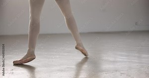 Ballet, shoes and legs in performance, dance or professional moving in studio. Ballerina, woman and pointe feet of creative person in art training, workout or exercise for fitness, health or wellness