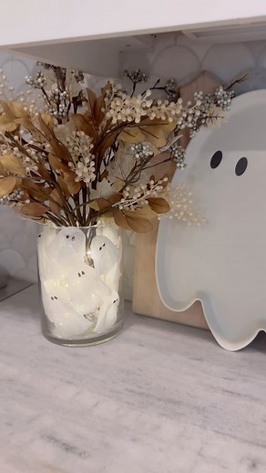 Ashley Savage | Creator | Atlanta, GA on Instagram: "👻Easy cheesecloth ghost display👻 made the cutest little cheesecloth ghosts and added them to a vase with lights to make them light up!! This is so easy to do and would be perfect for Halloween party decor or even just to keep on display during spooky season! I can share a tutorial on how to make the cheesecloth ghosts if yall are interested! All the florals are from hobby lobby! • • • #spookyseason #ghostdiy #halloweendecor #halloweenhome #h