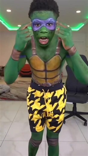 Rakai dresses as ninja turtle