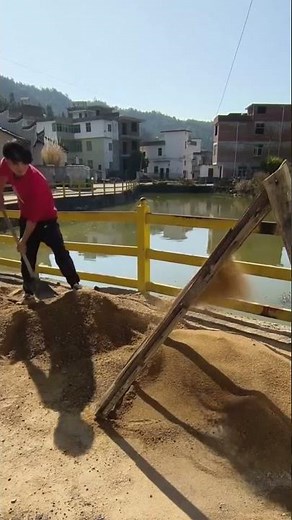 How Workers Separate Stones from Sand Using an Inclined Sieve