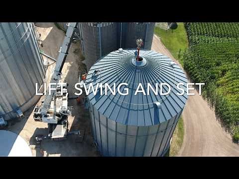 Large 75,000 bu Sukup Grain Bin Crane lift and Swing onto a new Foundation.