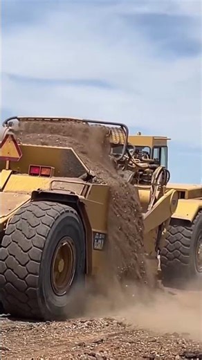 CAT scraper in action. #constructionequipment #constructionlife #scraper