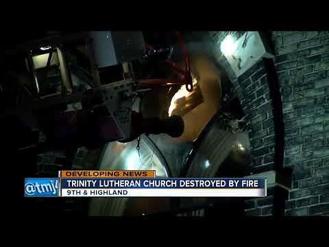 Overnight fire flares up again at Trinity Evangelical Lutheran Church