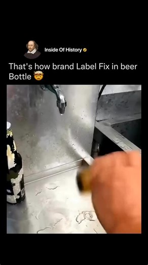 Inside Of History on Instagram: "Follow (us) @insideofhistory to learn something NEW everyday 🧠💫 Brand labels on beer bottles are fixed using an automated labeling machine designed for precision and speed. Once the bottles are cleaned and filled, they move along a conveyor belt toward the labeling section. Here, a roller or adhesive applicator applies glue or pressure-sensitive stickers to the exact spot on each bottle. The labels are then pressed firmly to ensure they stick smoothly without w