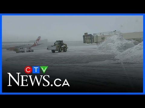 Major travel disruptions at Toronto Pearson airport as winter storm dumps up to 50 cm of snow