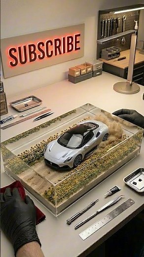 The Maserati MC20 kicks up dust inside a glass cube! 🌾💨
