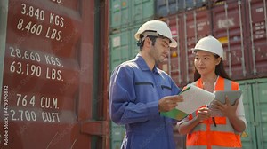 logistic inventory check caucasian staff working engineer in the construction container yard. worker and supervisor checking containers data. Container Shipping Logistics Engineering concept