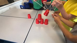 The Almost Impossible Pyramid Challenege! Get ready for some serious teamwork and a whole lot of laughs with the "Almost Impossible Pyramid" challenge! 🎉 This game is absolutely brilliant for getting kids talking, collaborating, and having a blast. In the video, you'll see my Year 3s and 4s in groups of five or six, each with a piece of string and an elastic band. Their mission? To build a pyramid of cups! 🏆 They have to thread the string through the elastic band, pull it apart, and then, work