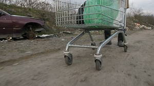 Homeless man going through a garbage can - Free Stock Video