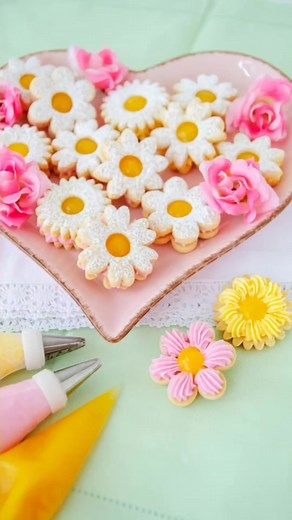 1K views · 23 reactions | Flower Sandwich Cookies filled with buttercream and lemon curd; the perfect treat for Easter or Mother's Day!  Cutter Set including Linzer Cookies Recipe & Instructions available in our shop. #flowercookies #sandwichcookies #mothersdaycookies #mothersdaygifts #eastertreats #bakingwithkids #cookiecutters #linzercookies #cookiedecorating #cakedecorations #easterbrunch #mothersdaygiftideas | 3D Cookie Cutter Shop - De Koekenbakkers | Facebook