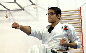 Teenager to achieve black belt in karate despite being born with spina bifida and being immobile