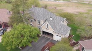 Give your home a touch of timeless elegance with IKO Crowne Slate Regal Stone #shingles. Inspired by the luxurious look of natural slate, they’ll crown the castle you call home while offering fortress-like protection against the elements. 🏰✨ Classically charming and refined, these shingles pair beautifully with stone, wood, brick, and siding in shades of white, beige, or grey. | IKO Roofing