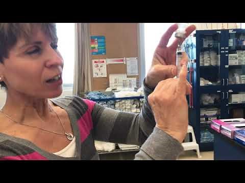 VIDEO CAPSULE preparing an injection with a vial