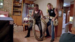 1M views · 23K reactions | A massive reticulated python slithers loose in a family home, targeting Billy and Ricky for dinner. ️ #BillyTheExterminator | Billy the Exterminator on A&E | Facebook