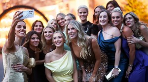 Rahm's wife steals show in plunging see-through dress with glam Ryder Cup Wags