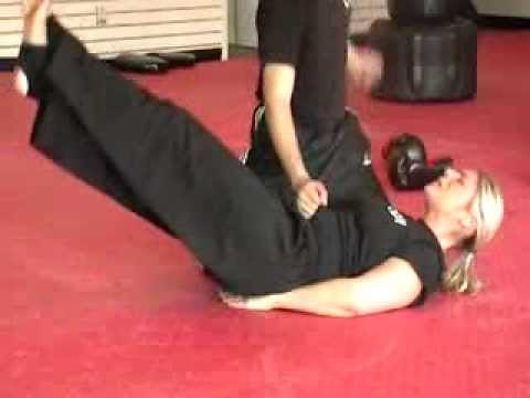 Hot woman mma and kickboxing figher getting punched in the stomach nyc and long island.MOD