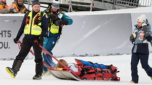 Skier, 26, dragged off slope on stretcher after terrifying high-speed crash